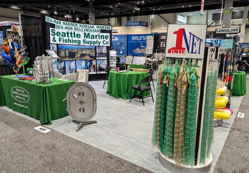 Ichi Net display stand of green netting at a fishing trade show
